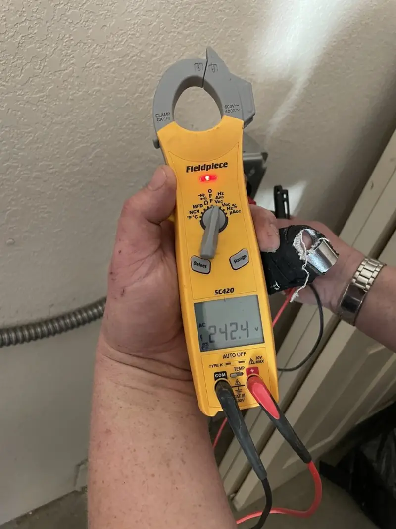 Voltage testing with clamp meter during Generator Installation in Menallen